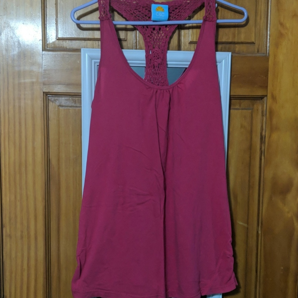 Bright pink top with knitting in back